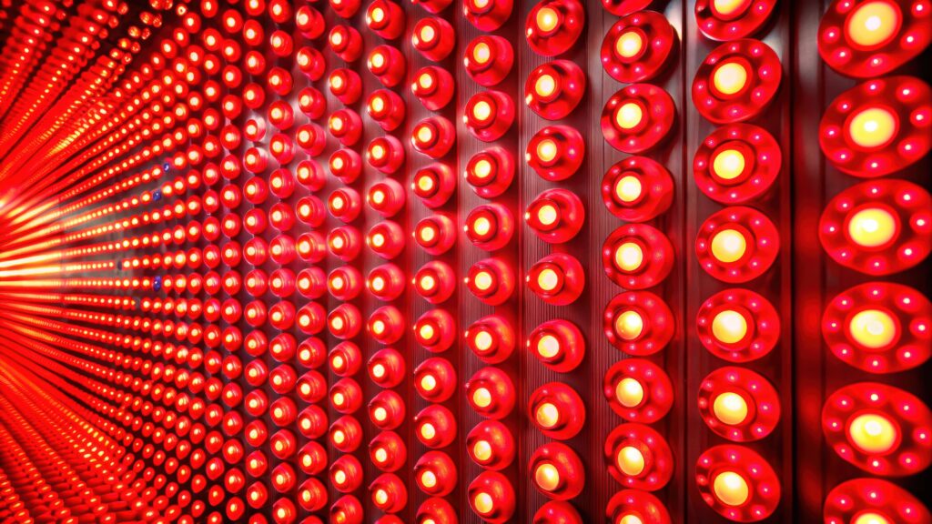 Wall of bright red decorative lights.