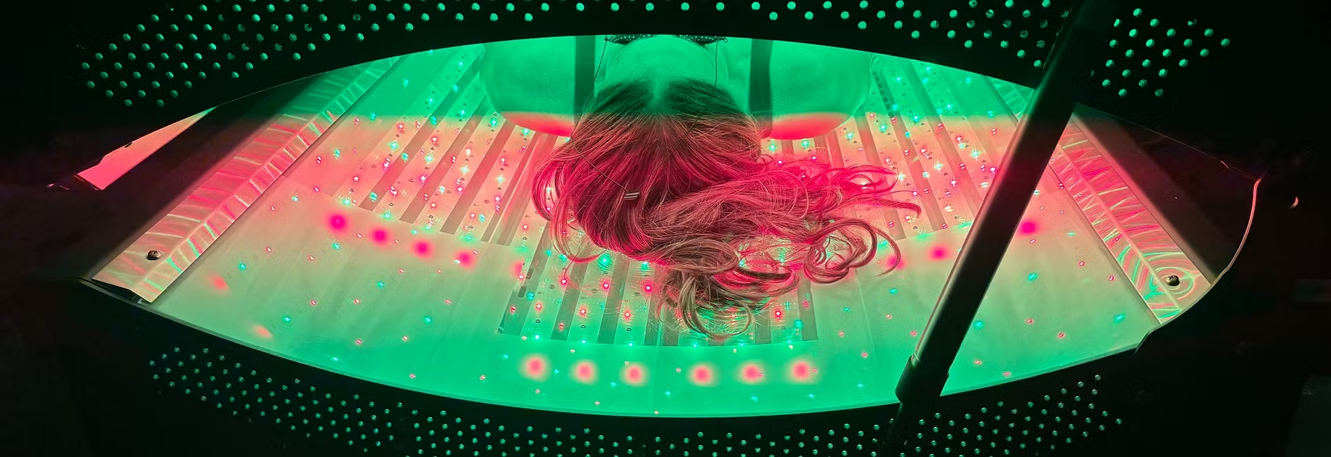 Colorful light therapy session with hair shown