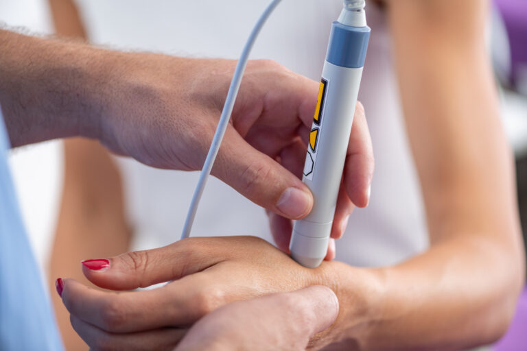 Light Therapy Face-Off: RLT vs Cold Laser